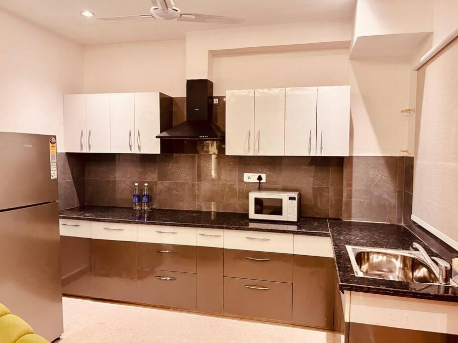 Kuchyň nebo kuchyňský kout v ubytování Olive Premium Apartment!