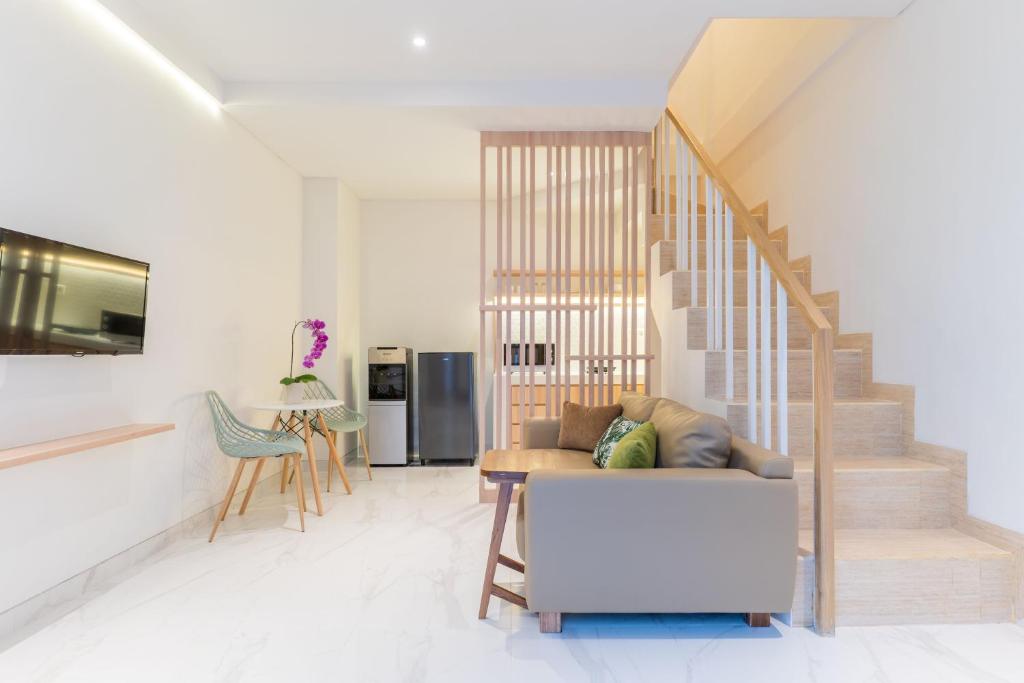 Et opholdsområde på Ellavie Aparthouse Kerobokan