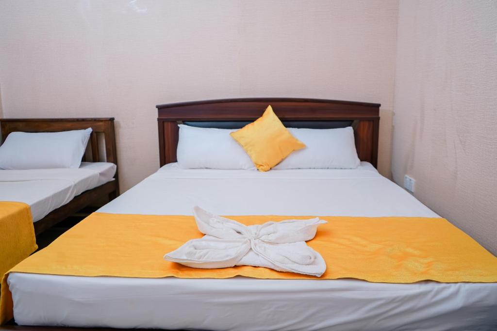 Postel nebo postele na pokoji v ubytování Anoo Garden Villa