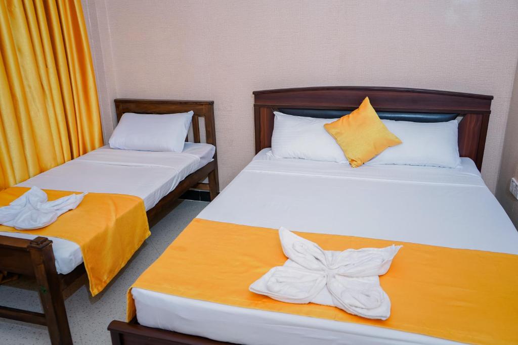 Postel nebo postele na pokoji v ubytování Anoo Garden Villa