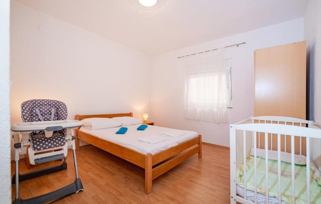 Posteľ alebo postele v izbe v ubytovaní Apartman - Starigrad Paklenica-Rovanjska, Zadarska