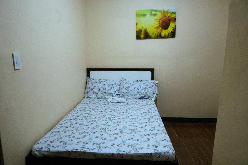 Postel nebo postele na pokoji v ubytování Villa Elsie Resort and Hotel