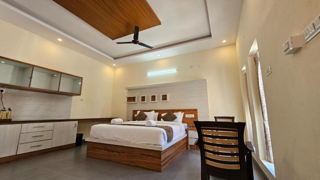 Postel nebo postele na pokoji v ubytování TIO -THE INDIAN ORIGIN HOTELS & RESORTS - Yercaud