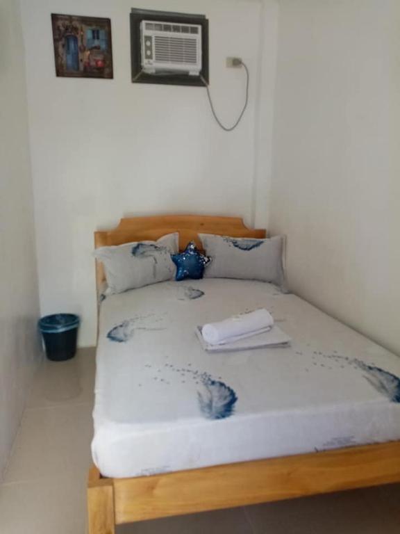 Postel nebo postele na pokoji v ubytování Pamarayeg Room