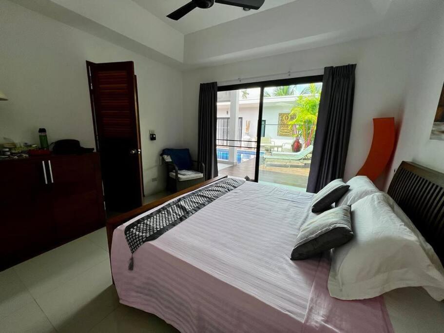 Postel nebo postele na pokoji v ubytování Villa Darring 4 chambres piscine