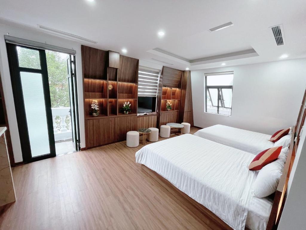 Postel nebo postele na pokoji v ubytování Trung Đức Homestay