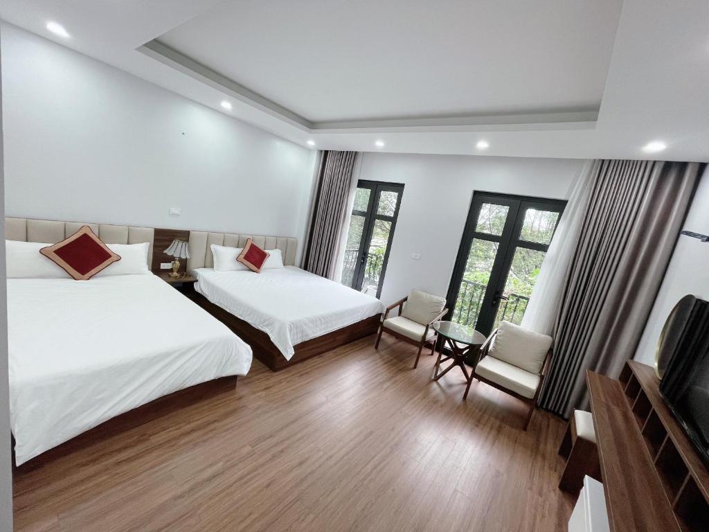 Postel nebo postele na pokoji v ubytování Trung Đức Homestay