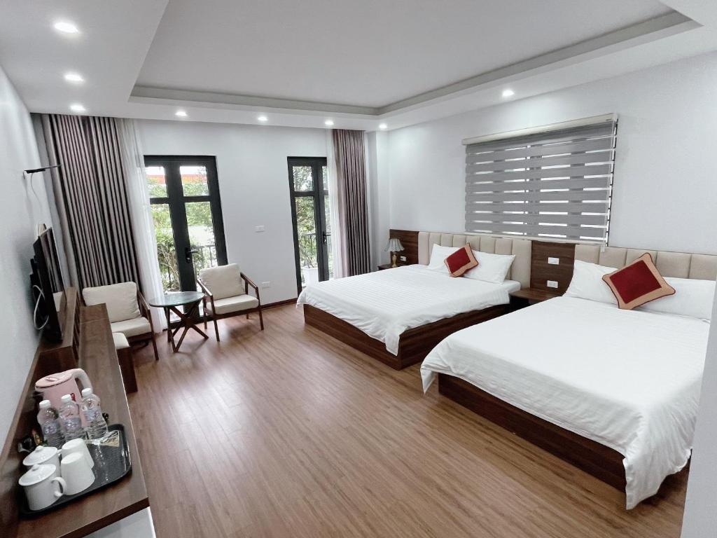 Postel nebo postele na pokoji v ubytování Trung Đức Homestay