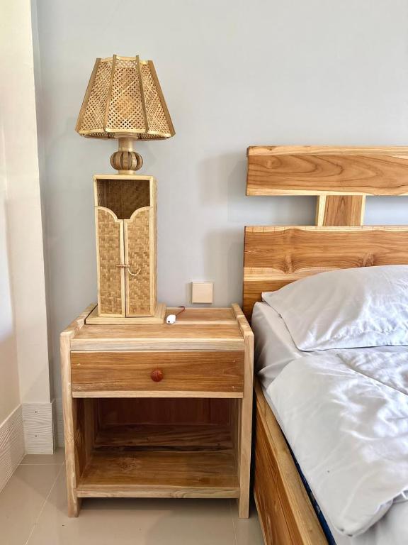 Postel nebo postele na pokoji v ubytování Vanilla Cottage Tetebatu