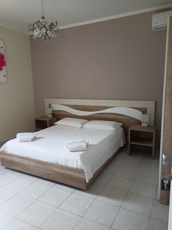 Postel nebo postele na pokoji v ubytování B&B AEREOSTATION