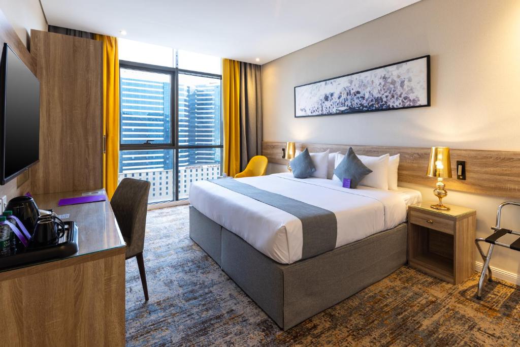Postel nebo postele na pokoji v ubytování Anan Hotel by Snood