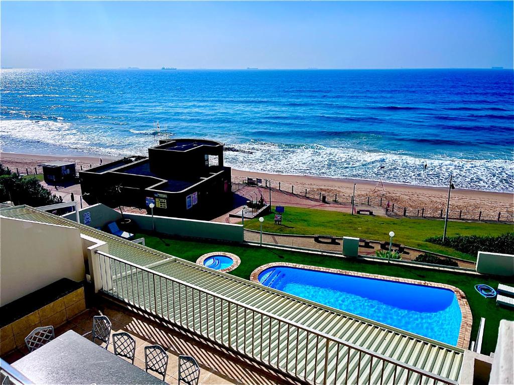 a view of the ocean from the balcony of a condo at 503 Marbella Beachfront Apartment in Durban