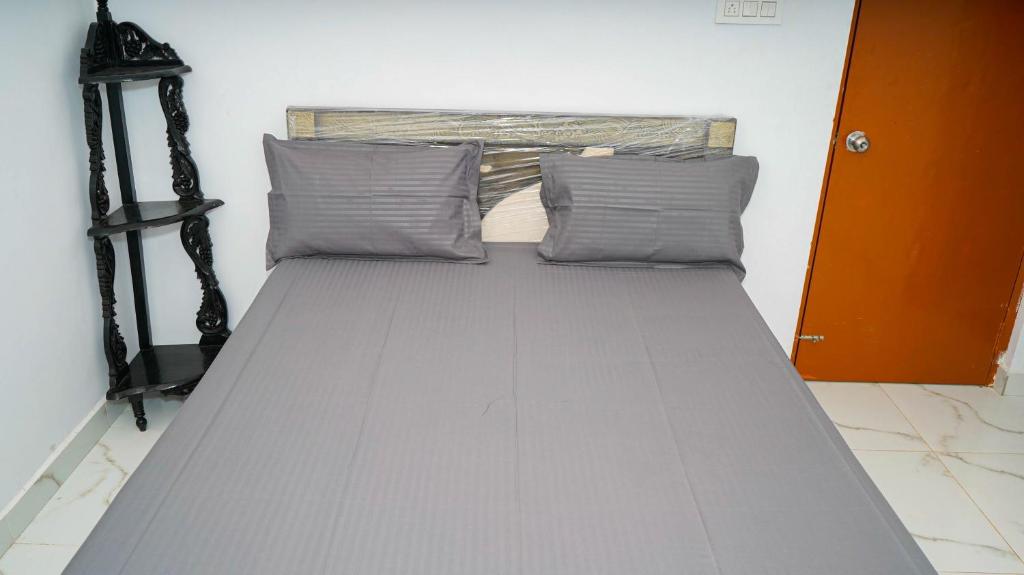 Postel nebo postele na pokoji v ubytování LAGUNA Guest house