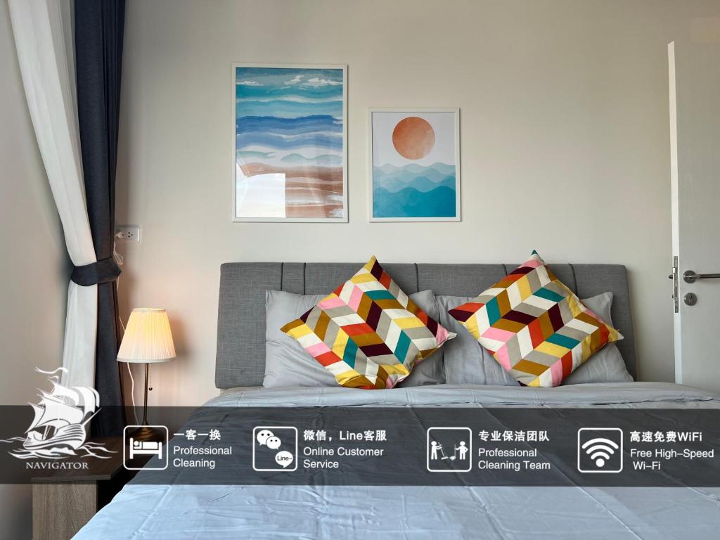 Voodi või voodid majutusasutuse Ramkhamhaeng Condo toas