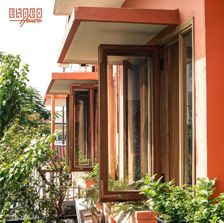 a row of windows on the side of a building at ChocoHouse in Hue