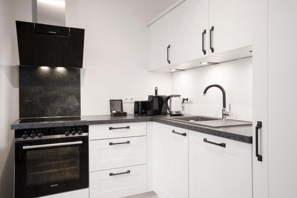 Cucina o angolo cottura di easy flat Villach main plaza