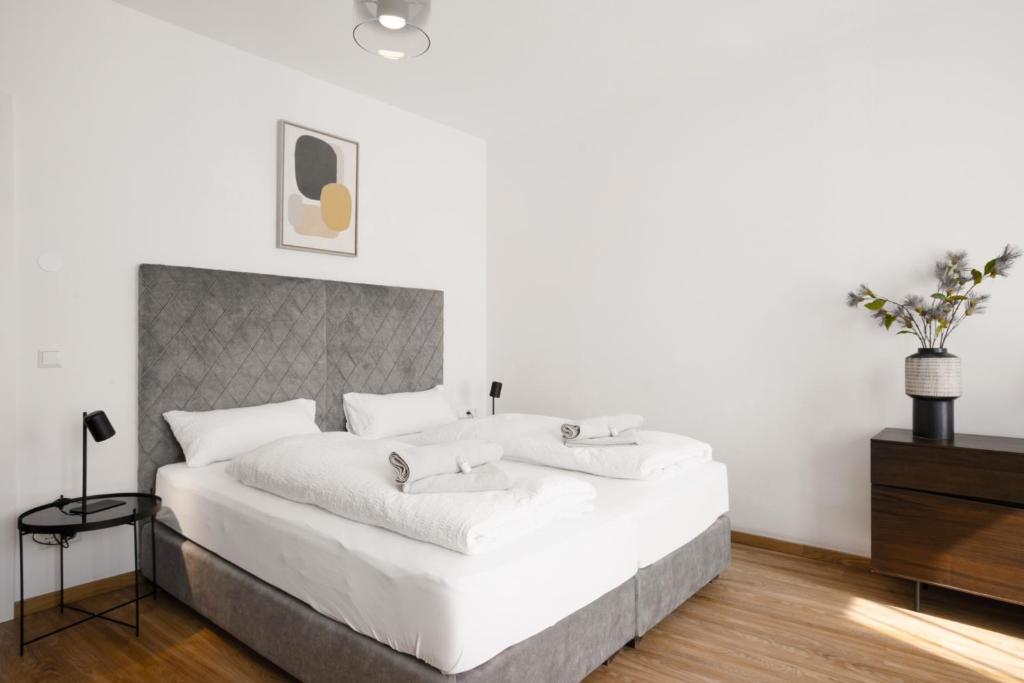 Letto o letti in una camera di easy flat Villach main plaza