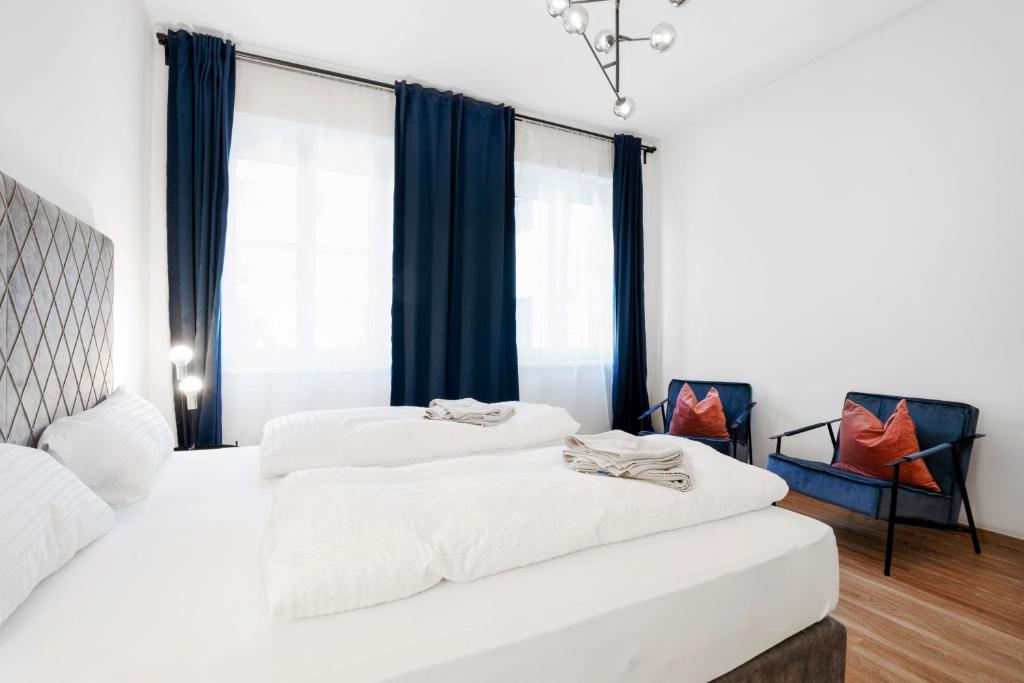 Letto o letti in una camera di easy flat Villach main plaza