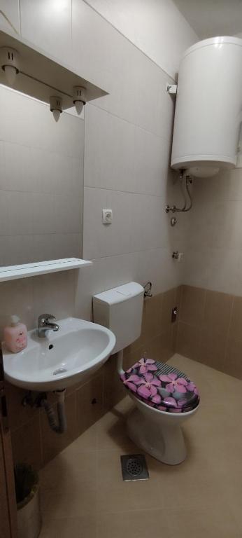 Koupelna v ubytování Apartment Štrbić