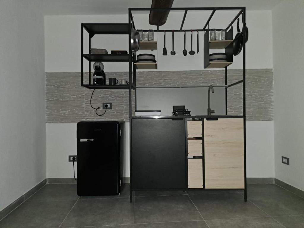 Kuchyň nebo kuchyňský kout v ubytování Alloggiamo