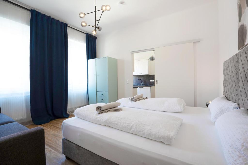 Letto o letti in una camera di easy flat Villach main plaza