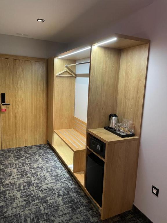 Kuchyň nebo kuchyňský kout v ubytování HA Hotel Mostar