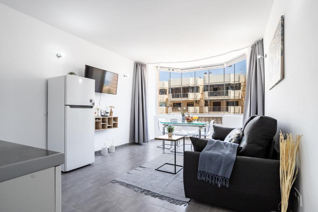 Kuchyň nebo kuchyňský kout v ubytování Sur Suites Palmeras 487