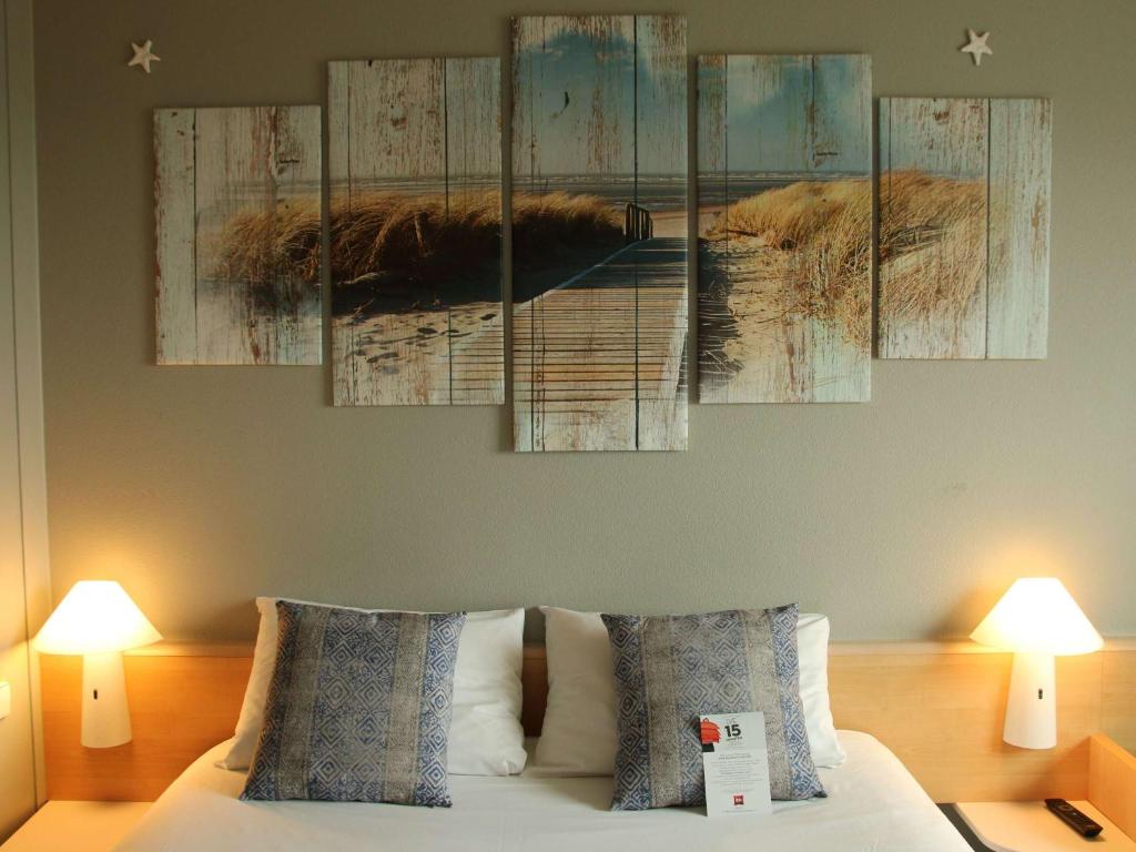 Postel nebo postele na pokoji v ubytování ibis Hotel Berlin Spandau