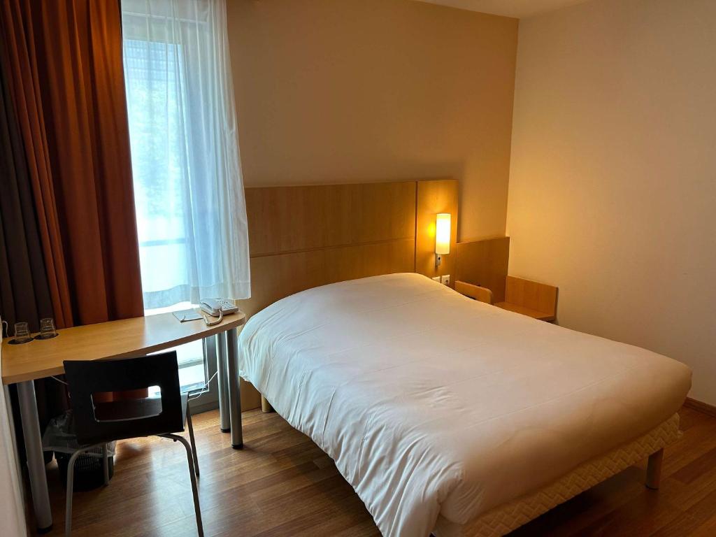 Postel nebo postele na pokoji v ubytování ibis Esch Belval
