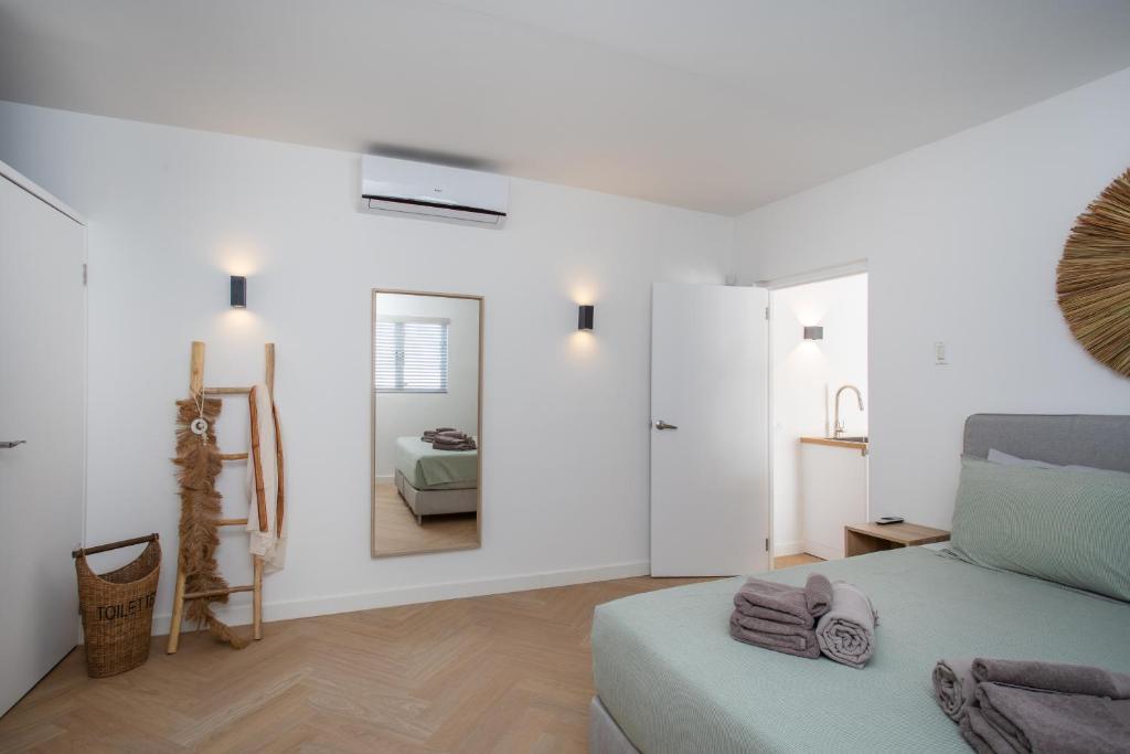 Postel nebo postele na pokoji v ubytování Appartement James