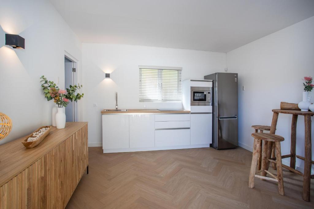 Kuchyň nebo kuchyňský kout v ubytování Appartement James