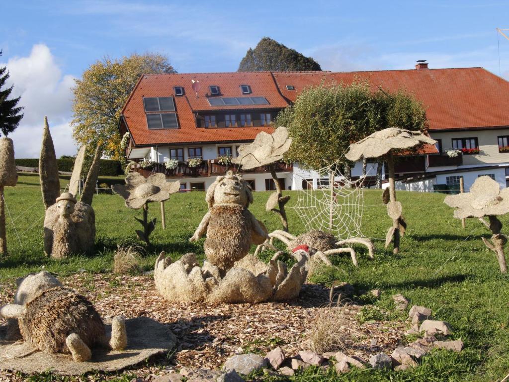 a group of stuffed animals sitting in the grass at Haus Morgensonne in Höchenschwand