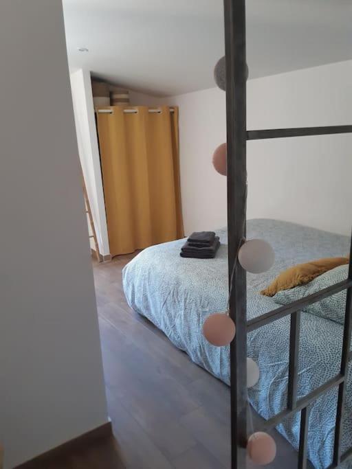 Postel nebo postele na pokoji v ubytování Duplex de 24m2 classé 2 étoiles à 2km d'Aubenas