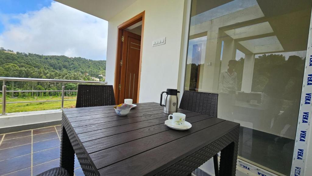 Balkón nebo terasa v ubytování TIO -THE INDIAN ORIGIN HOTELS & RESORTS - Yercaud