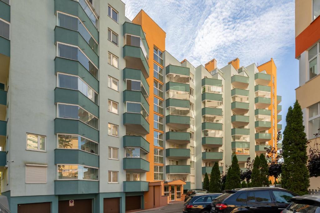 an image of an apartment building with balconies at Comfy Apartments with Balcony Turystyczna Międzyzdroje by Renters in Międzyzdroje