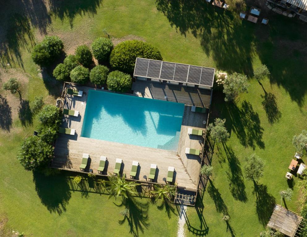 an overhead view of a house with a swimming pool at Résidence Casarina in Bonifacio
