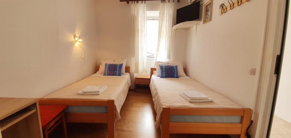 Posteľ alebo postele v izbe v ubytovaní Apartments Jurić - 2 A lovely room for 2