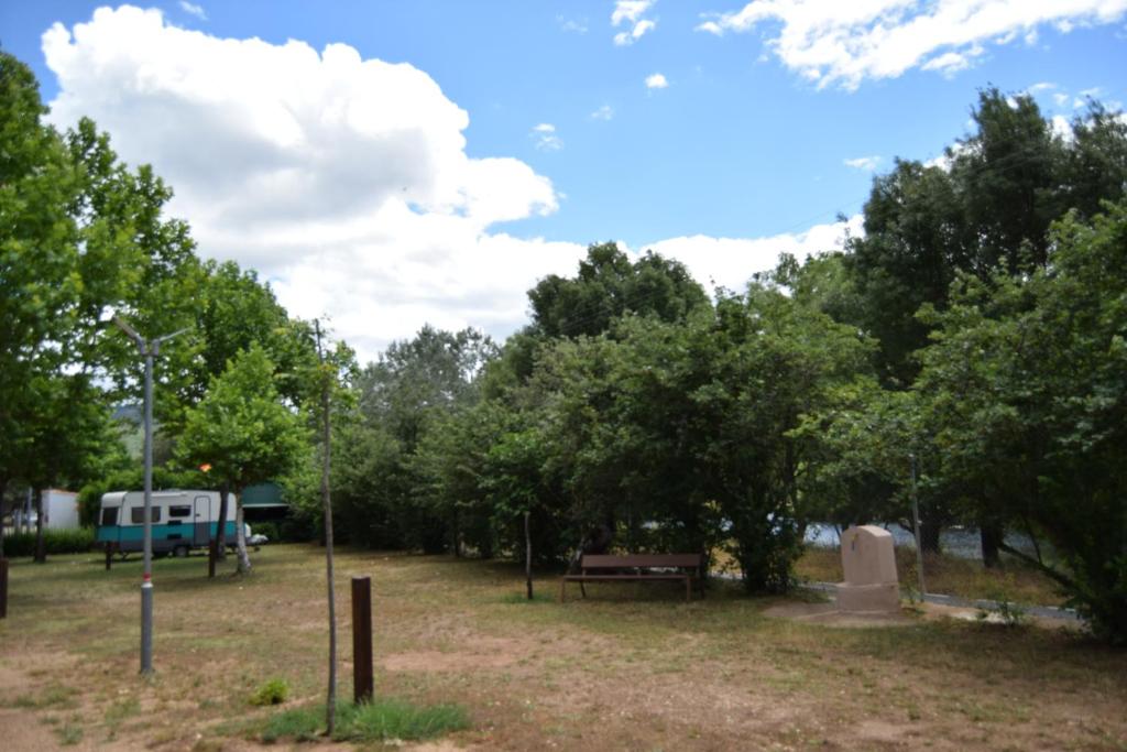 A garden outside Bungalows, Camping Vega de Francia
