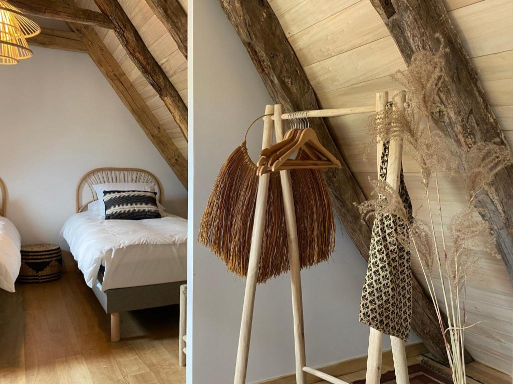 Postel nebo postele na pokoji v ubytování Le Domaine Quercus