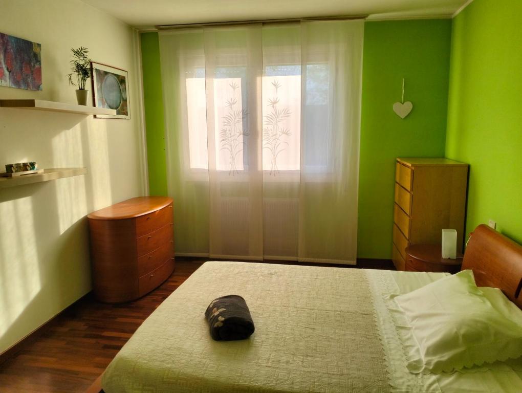 Postel nebo postele na pokoji v ubytování Dimora Poderina Cod Z01019