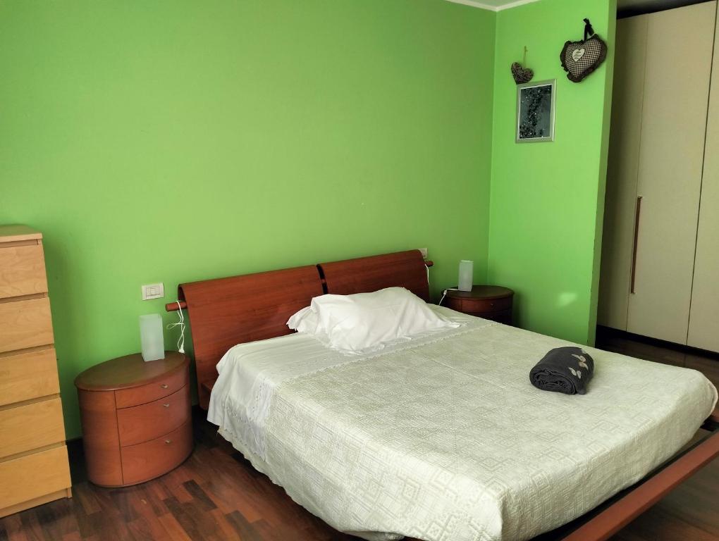 Postel nebo postele na pokoji v ubytování Dimora Poderina Cod Z01019