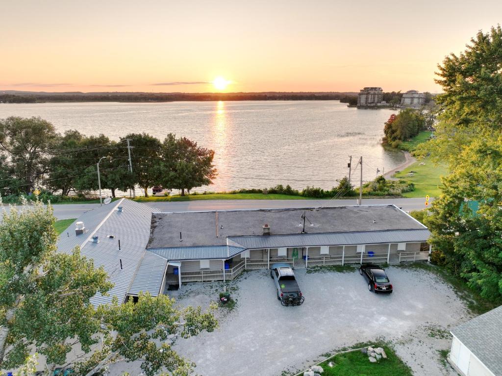 an aerial view of a building next to a body of water at Lakeside Inn in Orillia