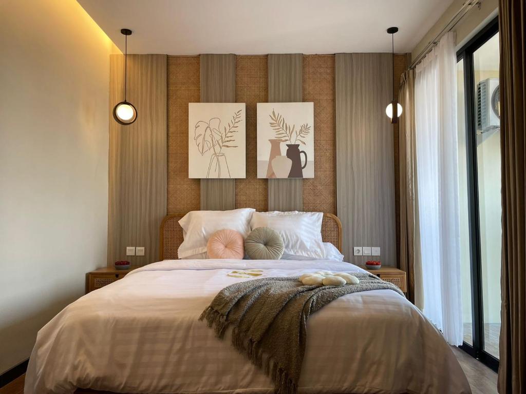Postel nebo postele na pokoji v ubytování Stay.vie Hotel