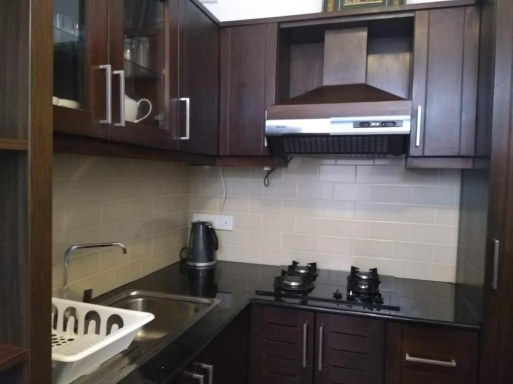 Kuchyň nebo kuchyňský kout v ubytování Nuwara eliya Luxury Apartment