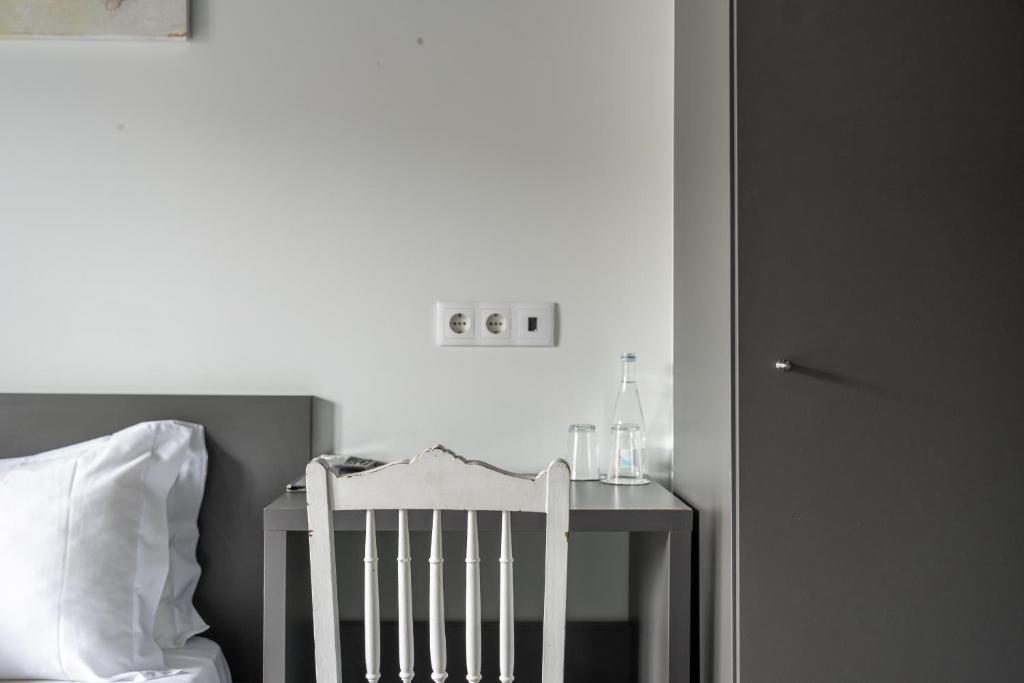 Postel nebo postele na pokoji v ubytování Residencial Kuarenta&Um