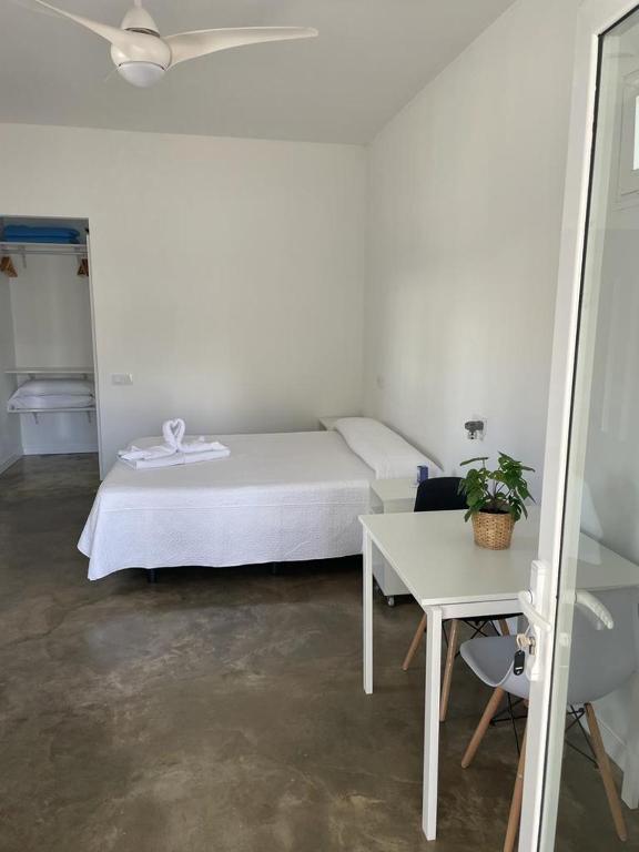 Postel nebo postele na pokoji v ubytování Apartamentos Punta Elena Beach