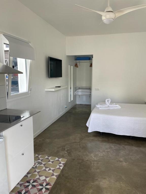 Postel nebo postele na pokoji v ubytování Apartamentos Punta Elena Beach