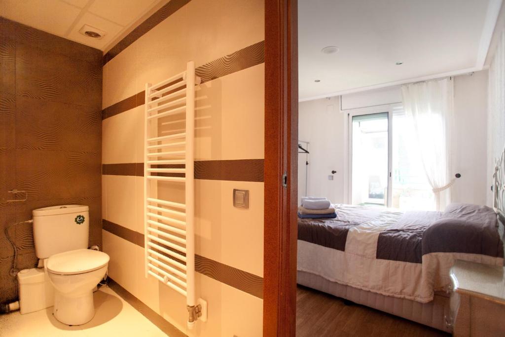Posteľ alebo postele v izbe v ubytovaní Apartamento Amposta