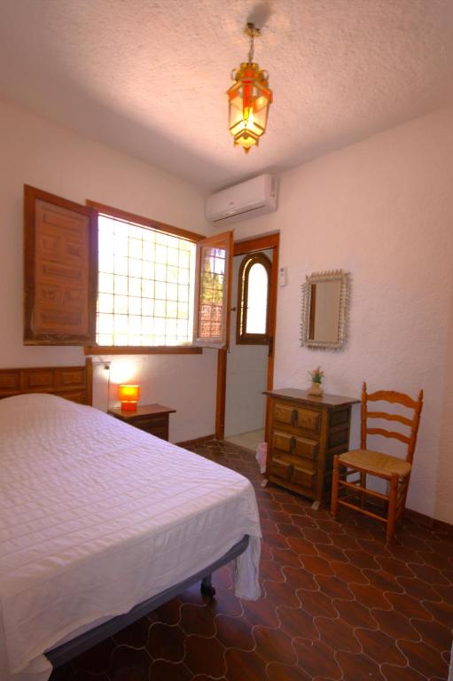 Postel nebo postele na pokoji v ubytování Holiday Home La Cartuja