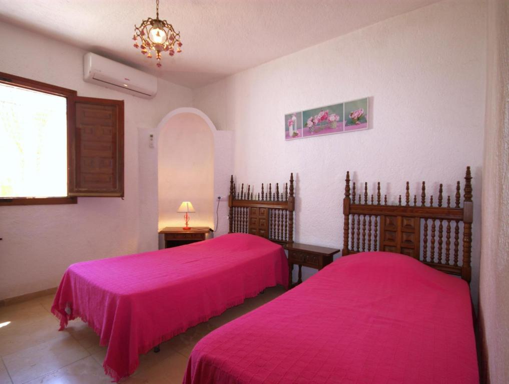 Postel nebo postele na pokoji v ubytování Holiday Home La Cartuja
